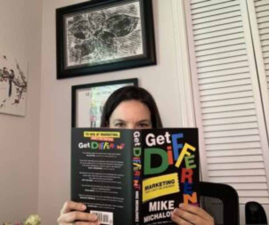 Tina reads the book Get Different